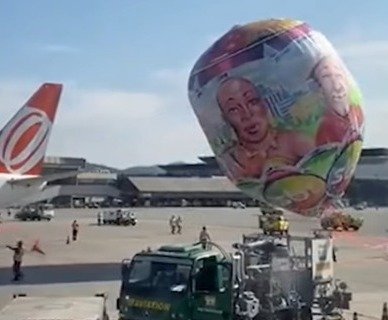 Vídeo: balão gigante com logo do SBT cai e atinge aviões em Guarulhos